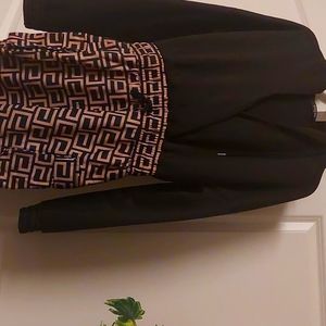 Black and brown dress sweat suit material with hood and pockets on side